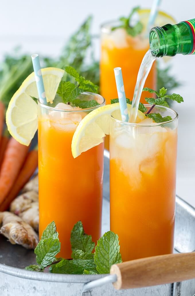 Ginger-Mint-Carrot-Cooler --Warm weather is here and it's time to ring it in with some of the blogosphere's best refreshing spring cocktails!