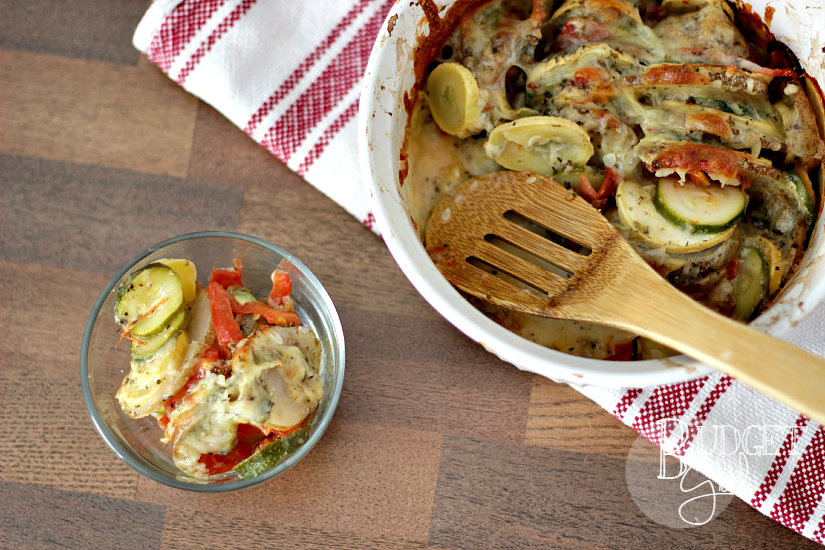 Crispy herbed vegetables covered in pepper jack cheese, perfect as a summer side. This vegetable tian uses zucchini squash, potato, and tomato. You can add onion and eggplant, as well.