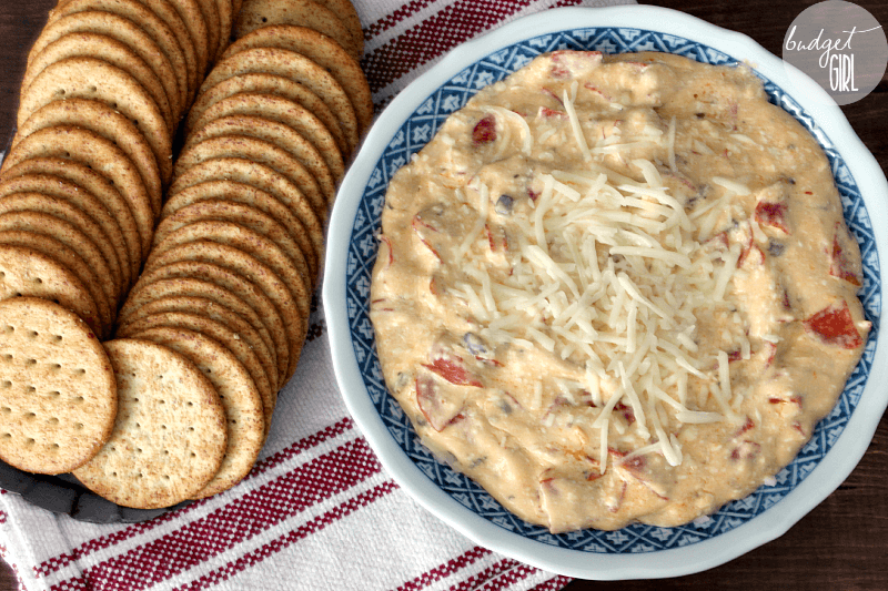 Slow Cooker Pepperoni Dip --- Only 3 ingredients! This dip is super easy and is like crack at any party. You won't be taking any extra home. :P || via diybudgetgirl.com #pepperoni #dip #gameday #party #superbowl #recipes #slowcooker #crockpot #3ingredient #easy #quick