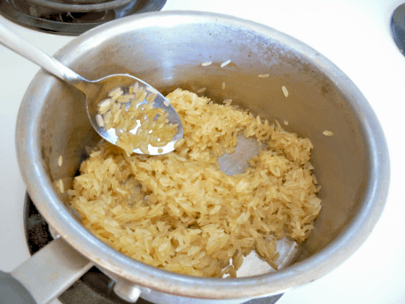 Easy Cheesy Rice Risotto // Budget Girl --- Uses simple ingredients, takes only 20 minutes to make, and your family will LOVE it!