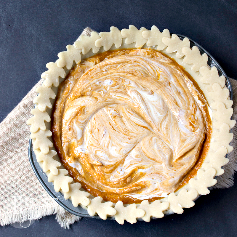 Marbled Pumpkin Pie is a beautiful, yet easy pie to make. Use a pre-made pie shell to make it easier, or a homemade shell to dress it up. This will absolutely impress your guests!