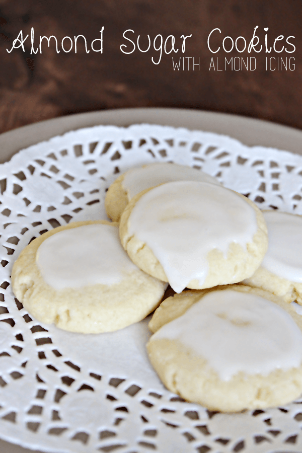 Almond Sugar Cookies --- Incredibly soft, melt in your mouth, and are topped with almond icing. I made this for the first time last year and it has become one of my favorite Christmas cookies.|| via diybudgetgirl.com #baking #cookies #almond #food #recipes 