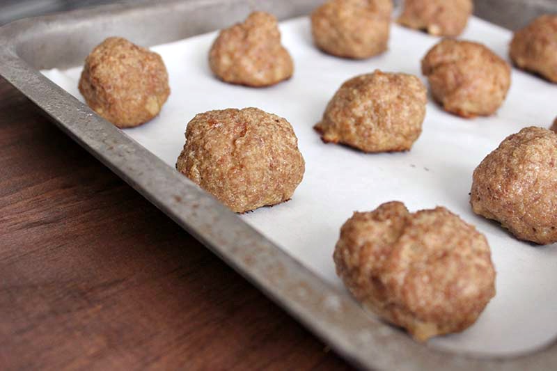 Homemade Turkey Meatballs --- These meatballs are delicious, soft, and flavorful. Use them in soups, in pasta, or as party appetizers. You can also freeze them and use them later. || via diybudgetgirl.com #homemade #turkey #meatballs #food #cooking #baking #recipes