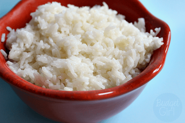 Lemon Coconut Rice // Budget Girl --- A light and fluffy rice, made with coconut milk and lemon juice. Perfect for Thai and Indian cuisines. #rice #coconut #lemon #sides #dinner