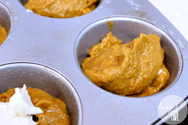 Pumpkin Cheesecake Muffins --- These muffins are delicious, but this post will serve a secondary purpose--explaining what baking soda and baking powder do in a recipe. || via diybudgetgirl.com #pumpkin #cheesecake #muffins #desserts #baking #13daysofpumpkin 