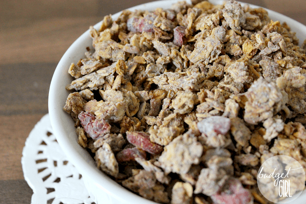 Pumpkin Spice Granola --- This lightly sweetened granola makes a great autumn breakfast or movie snack. Make just the granola or add nuts, dried fruit, seeds, chocolate chips, etc. || via diybudgetgirl.com #pumpkin #granola #autumn #fall #cereal #snacks #breakfast #13daysofpumpkin