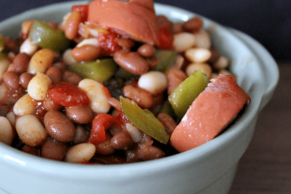 Baked Bean & Sausage Stew // Budget Girl --- This stew has a lot of texture, it's simple to make, and very hearty. #stew #sausage #beans #slowcooker #crockpot #recipes #food #cooking