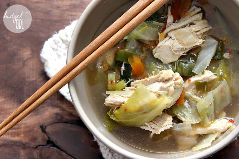 Spicy Chicken and Cabbage Soup --- Lemongrass, soy sauce, and red pepper flakes give this spicy chicken and cabbage soup that nice, Asian zing. This dish is very healthy--low carb, low calorie, and high in protein and fiber. Customize it by adding your favorite vegetables. || via diybudgetgirl.com #soup #cabbage #healthy #light #lowcarb #lowcalorie #chicken #poultry #vegetables