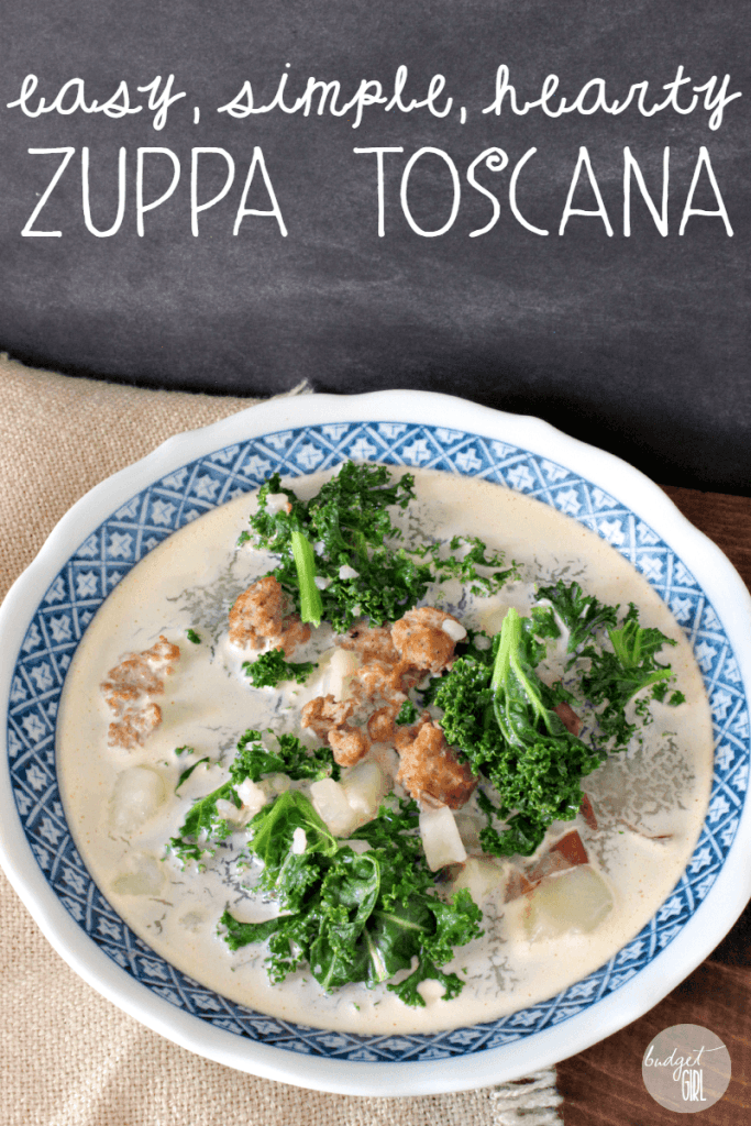 Zuppa Toscana is a hearty, creamy soup. It's filled with Italian sausage, red potatoes, and kale. Make it paleo by substituting the heavy cream for coconut cream and the bouillon cubes for regular broth. || via diybudgetgirl.com #soup #paleo #zuppa #toscana #olivegarden #sausage #potatoes #easy #kale #onepot #comfort