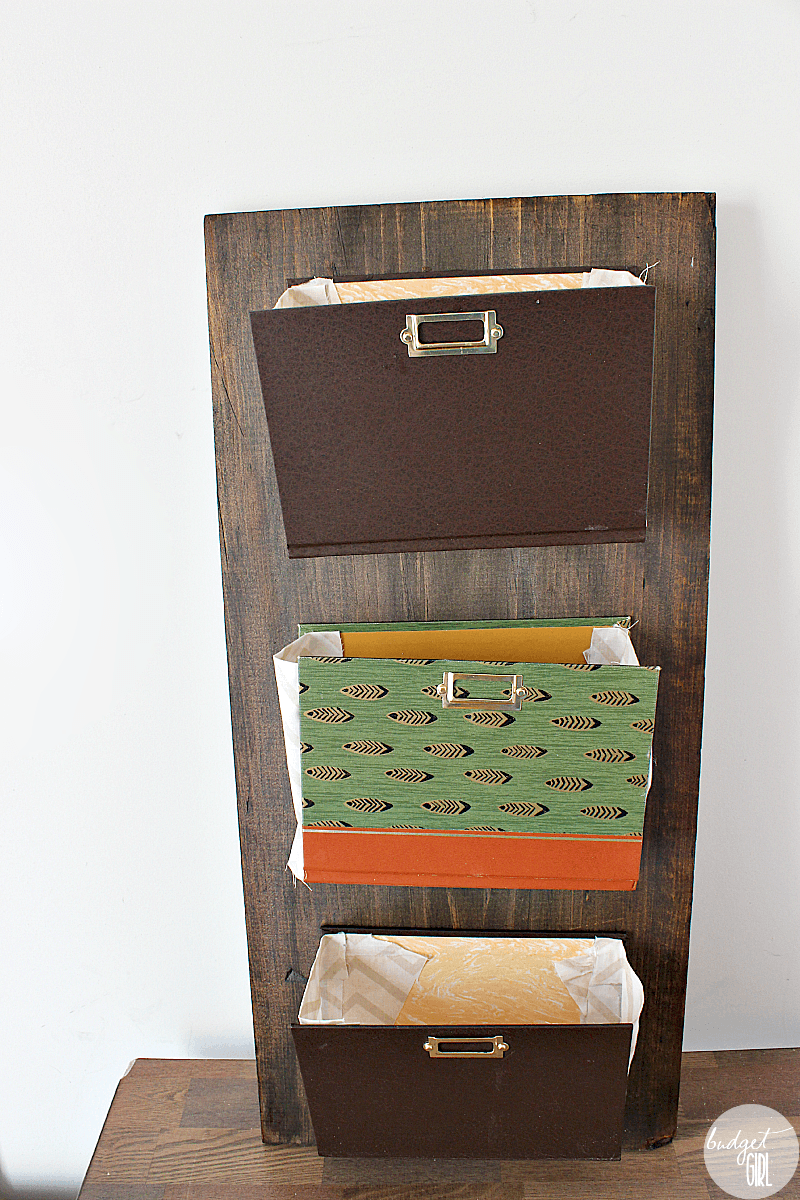 Old Book Mail Organizer --- Have some old books with missing pages? Turn them into a mail organizer! || via diybudgetgirl.com #books #old #mail #organizer #office #kitchen #diy #recycle