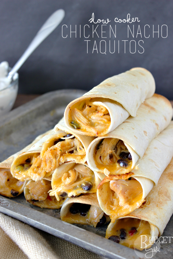 Slow cooker chicken nacho taquitos are very easy to make and healthier than regular taquitos because they're baked, not fried. || via diybudgetgirl.com #taquitos #mexican #food #recipes #slowcooker #crockpot #onepot #familyfavorite #easy #bake #baked #notfried #nacho #chicken