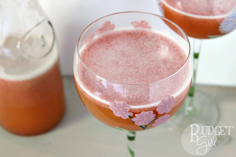 Strawberry Beermosas --- Strawberry Beermosas are a fun twist on a fruity favorite. Best with a light-tasting or citrus-y beer. These are a GREAT summer cocktail for beer-lovers. || via diybudgetgirl.com #beer #cocktails #beverages #drinks #alcohol #boozy #strawberry #summer #easy