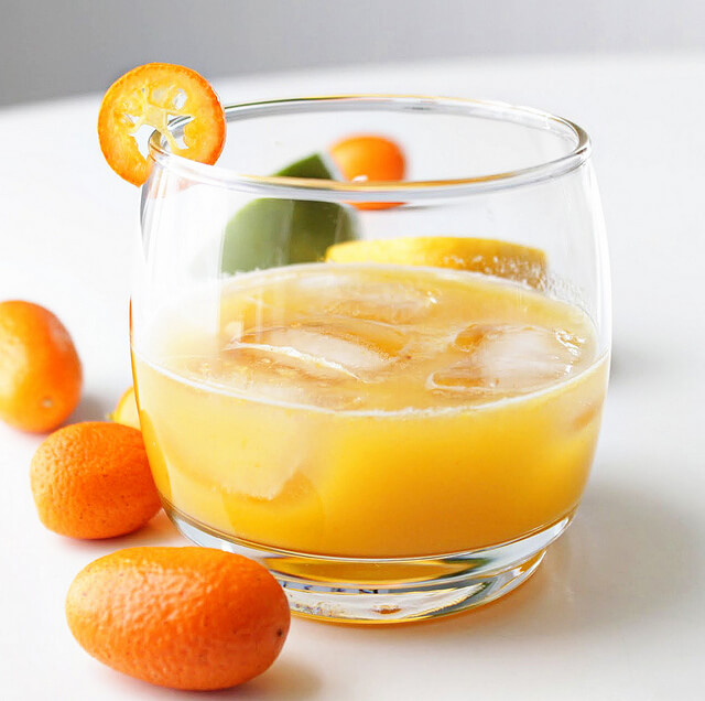 Kumquat Whiskey Sour -- Warm weather is here and it's time to ring it in with some of the blogosphere's best refreshing spring cocktails!