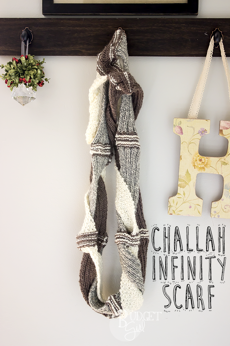 The challah infinity scarf is a textured, chunky-looking scarf using moss stitch and rib stitch. It's worked in three strips that are braided and stitched together to create its unique look.